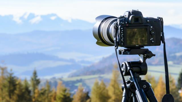 DSLR camera over a scenic view 